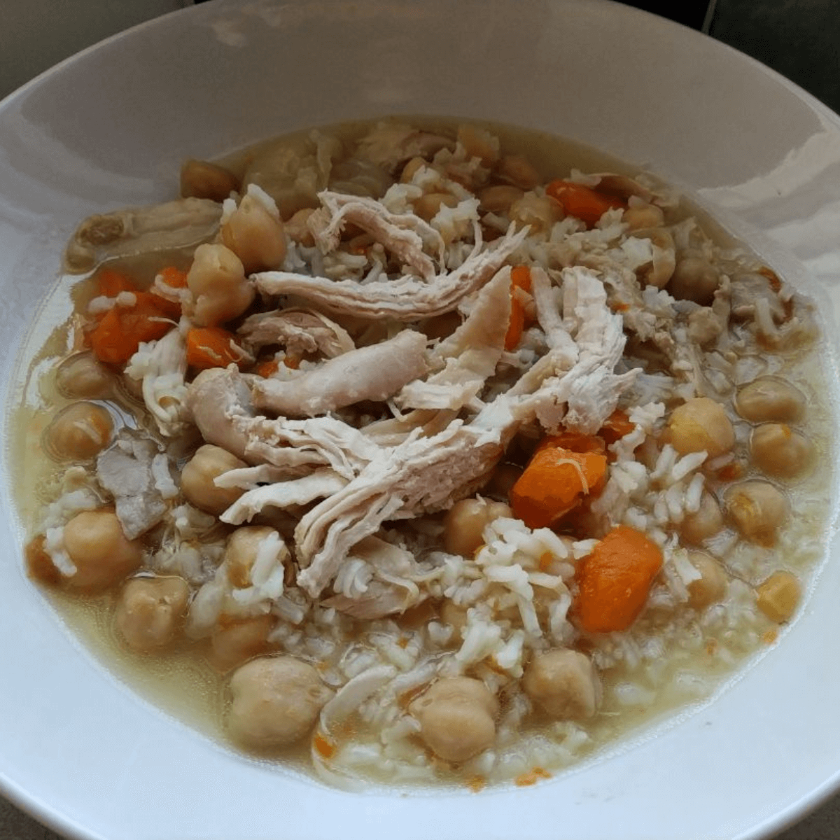 ひよこ豆と豚肉のスープ（プチェロ）の写真